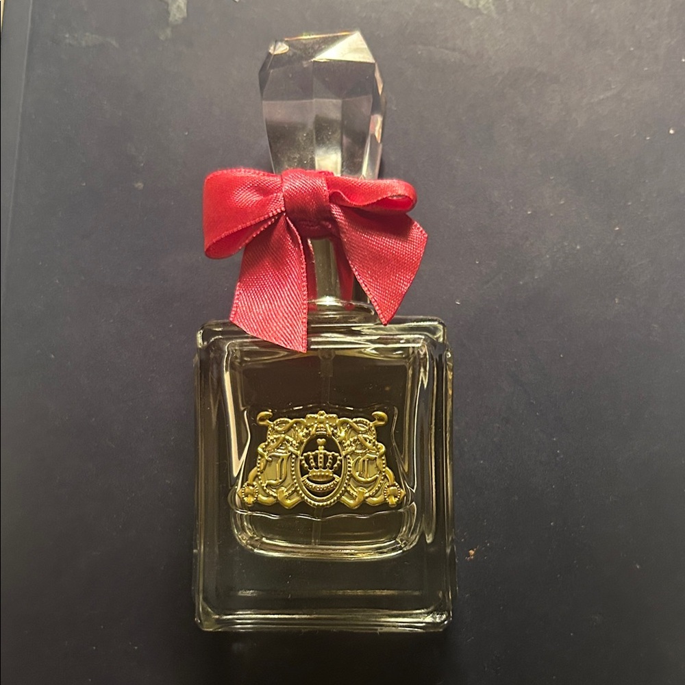 Juicy Couture with Red Bow and Gold Emblem